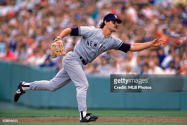 Don Mattingly of the New York Yankees throws the ball during a game. Mattingly played for the Yankees from 1982-1995.