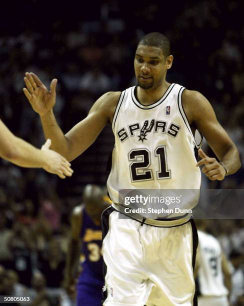 Tim Duncan of the San Antonio Spurs celebrates in the fourth quarter against the Los Angeles Lakers in Game two of the Western Conference Semifinals...