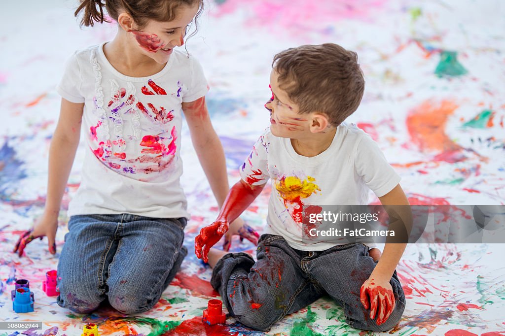 Fun Childhood Finger Painting Brother and Sister