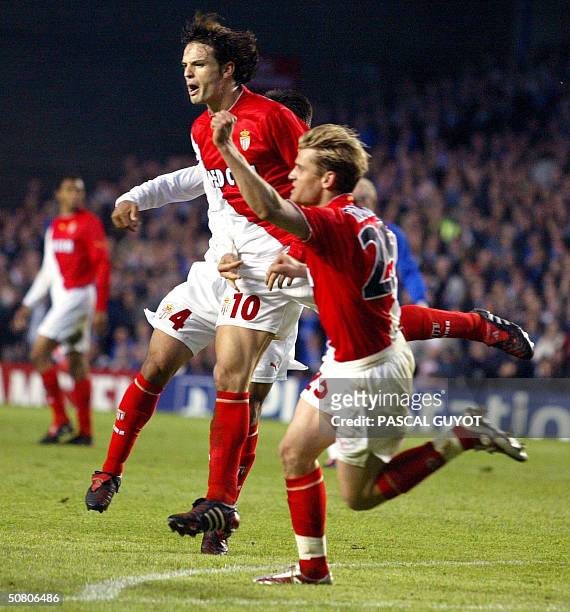 Monaco forward Jerome Rothen and his Spanish teammate Fernando Morientes react after Morientes scored a goal during their Champions league semi-final...
