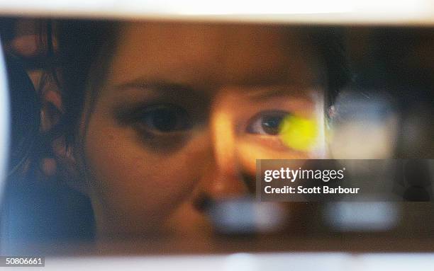 Womans face is reflected as she has her iris scanned by a camera on May 6, 2004 in London, England. Members of the British Home Affairs Select...