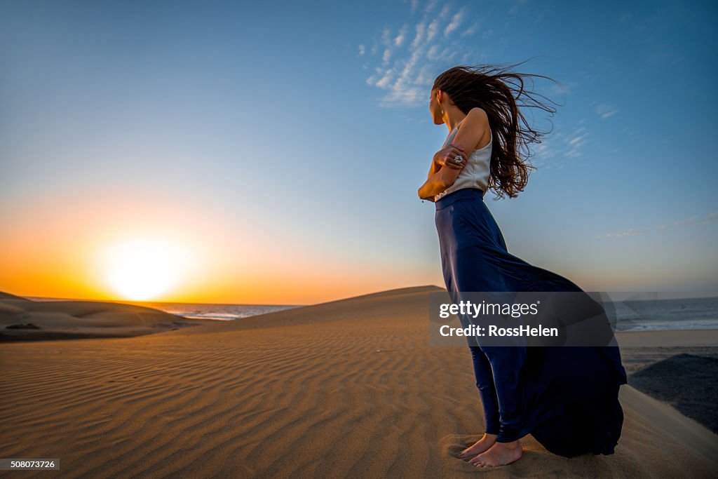 Woman on the sand dunes