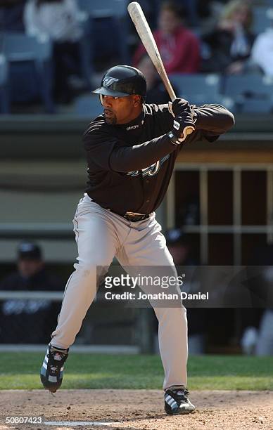 First baseman Carlos Delgado of the Toronto Blue Jays at bat during the game against the Chicago White Sox on May 2, 2004 at U.S. Cellular Field in...