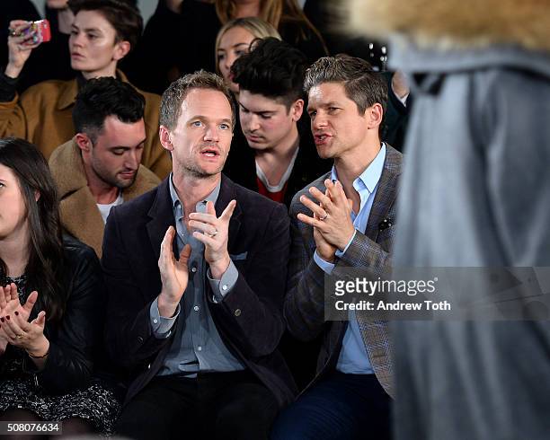 Neil Patrick Harris and David Burtka are seen front row during Ovadia & Sons New York Fashion Week Men's Fall/Winter 2016 at Skylight at Clarkson Sq...