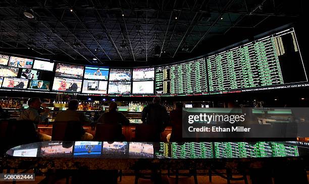 The betting line and some of the nearly 400 proposition bets for Super Bowl 50 between the Carolina Panthers and the Denver Broncos are displayed at...