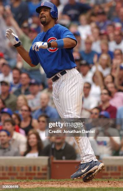 Derrek Lee of the Chicago Cubs does a Sammy Sosa-like hop after hitting a three-run home run in the fifth inning against the Arizona Diamondbacks May...