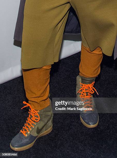 Rapper/Choreographer Sharaya J, Nike shoe fashion detail, attends the Bronxwrites' Poetry Slam Finals at Joe's Pub and The Library at The Public on...