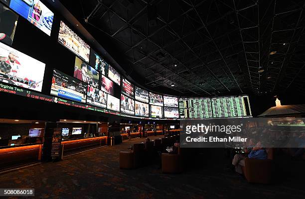 The betting line and some of the nearly 400 proposition bets for Super Bowl 50 between the Carolina Panthers and the Denver Broncos are displayed at...
