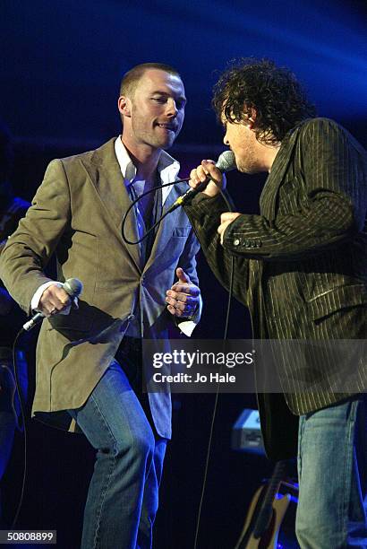 Zucchero performs on stage with Ronan Keating at a benefit show in aid of the United Nations' UNHCR refugees fund, at The Royal Albert Hall on May 6,...