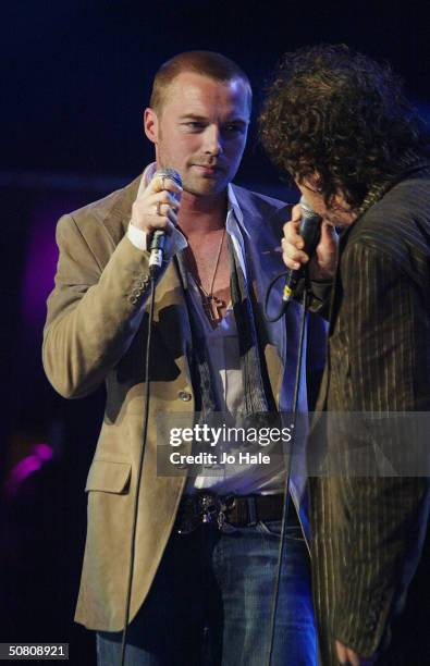 Zucchero performs on stage with Ronan Keating at a benefit show in aid of the United Nations' UNHCR refugees fund, at The Royal Albert Hall on May 6,...