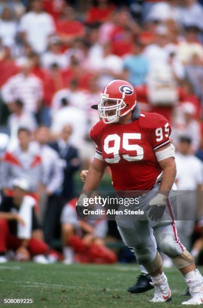 Bill Goldberg of the Georgia Bulldogs runs on the field during a game circa 1988 at Sanford Stadium in Athens, Georgia.