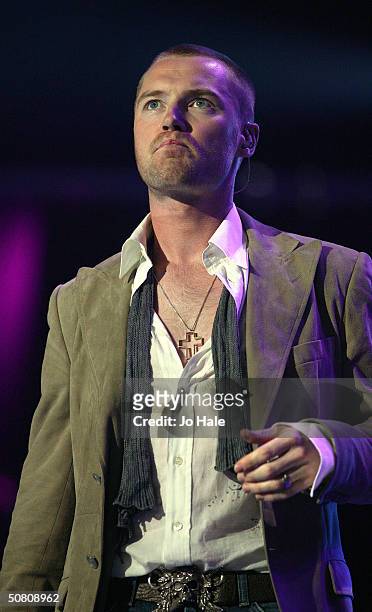 Ronan Keating performs on stage at a benefit show in aid of the United Nations' UNHCR refugees fund, at The Royal Albert Hall on May 6, 2004 in...