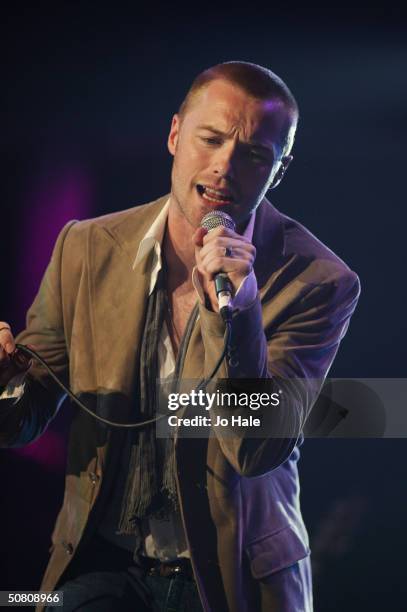 Ronan Keating performs on stage at a benefit show in aid of the United Nations' UNHCR refugees fund, at The Royal Albert Hall on May 6, 2004 in...