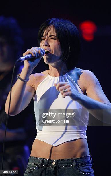 Dolores O'Riordan of The Cranberries performs at a benefit show in aid of the United Nations' UNHCR refugees fund, at The Royal Albert Hall on May 6,...