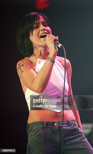 Dolores O'Riordan of The Cranberries performs at a benefit show in aid of the United Nations' UNHCR refugees fund, at The Royal Albert Hall on May 6,...