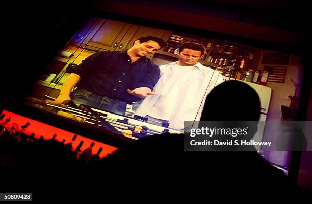 People watch the final episode of Friends on May 6, 2004 at Club 40/40 in New York City.