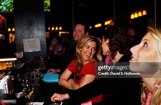James Gronsein, Kimberly Synnott, Susan Feinglass and Julie Abelson talk while watching the the final episode of Friends on May 6, 2004 at Club 40/40...
