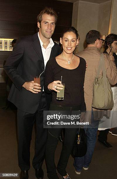 Tennis star Greg Rusedski and his wife Lucy Rusedski attend a private view and party for new photography show "Faces Of Sport" in aid of Special...