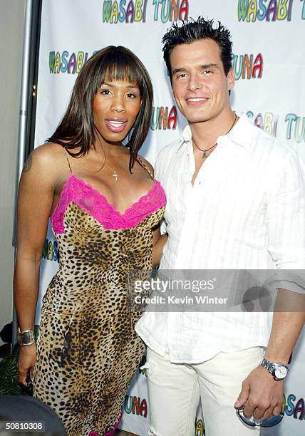 Actress Brown Sugar and actor Antonio Sabato Jr. Pose at the premiere of "Wasabi Tuna" at the Laemmle Sunset 5 Theatre on May 6, 2004 in Los Angeles,...