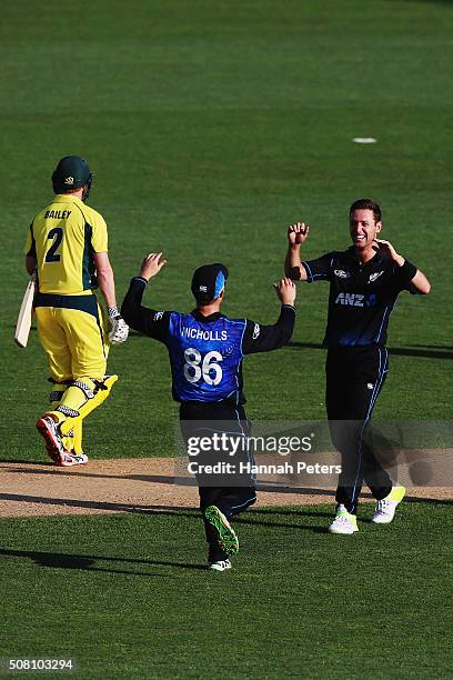 Matt Henry of the Black Caps celebrates the wicket of George Bailey of Australia during the One Day International match between New Zealand and...