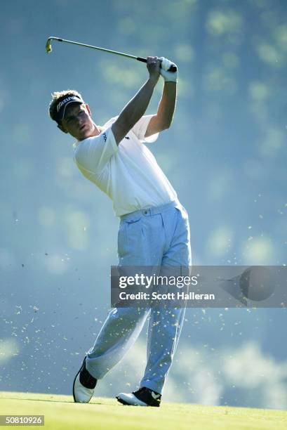 Luke Donald of England hits a shot on the 11th hole during the second round of the Wachovia Championship at the Quail Hollow Club on May 7, 2004 in...