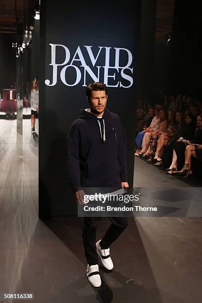 Jason Dundas showcases designs by Strateas Carlucci on the runway at the David Jones Autumn/Winter 2016 Fashion Launch at David Jones Elizabeth...