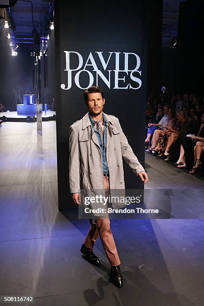 Jason Dundas showcases designs by Calibre on the runway at the David Jones Autumn/Winter 2016 Fashion Launch at David Jones Elizabeth Street Store on...