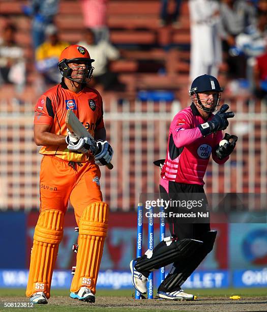 Tim Ambrose of Libra Legends celebrates after stumping Azhar Mahmood of Virgo Super Kings off the bowling of Brad Hogg of Libra Legends during the...