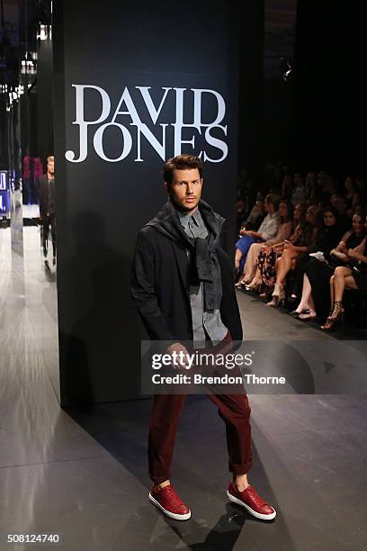 Jason Dundas showcases designs by Paul Smith on the runway at the David Jones Autumn/Winter 2016 Fashion Launch at David Jones Elizabeth Street Store...