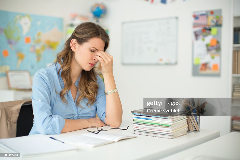 Teacher at classroom.