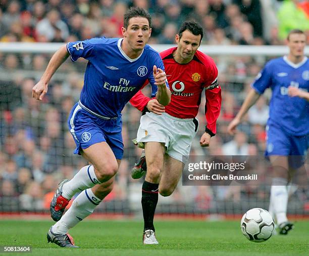 Rank Lampard of Chelsea gets away from Ryan Giggs of Man Utd during the FA Barclaycard Premiership match between Manchester United and Chelsea at Old...