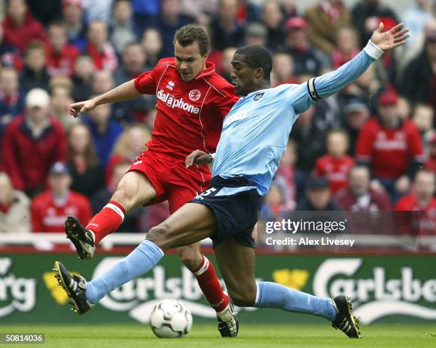 Sylvain Distin of Manchester City tackles Szilard Nemeth of Middlesbrough during the FA Barclaycard Premiership match between Middlesbrough and...