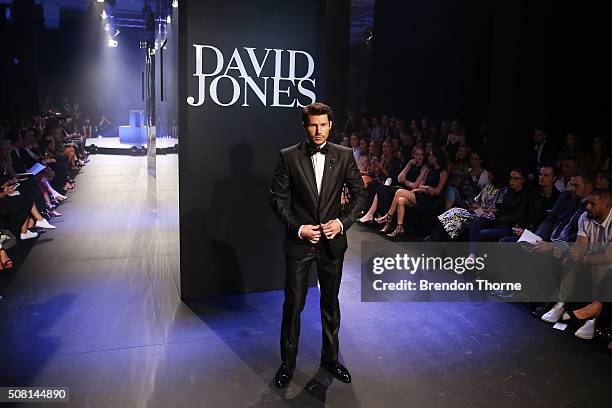 Jason Dundas showcases designs by Versace on the runway at the David Jones Autumn/Winter 2016 Fashion Launch at David Jones Elizabeth Street Store on...