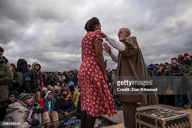 Amanda Wilkin playing Ophelia from Shakespeare's Globe performs Hamlet to migrants at the Good Chance Theatre Tent in the Jungle Refugee Camp on...