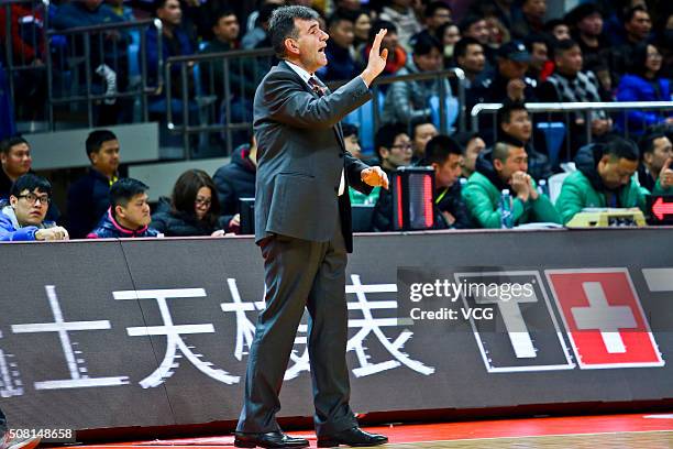 Memi Becirovic, head coach of Jiangsu Dragons, speaks to his players during the 37th round of the Chinese Basketball Association 15/16 game between...