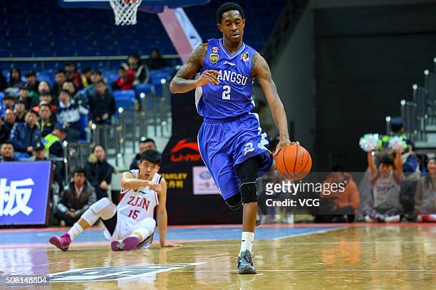MarShon Brooks of Jiangsu Dragons drives the ball during the 37th round of the Chinese Basketball Association 15/16 game between Zhejiang Golden...
