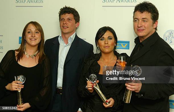 Eastenders soap stars Natalie Cassidy, Nigel Harman, Jessie Wallace and Shane Richie pose in the pressroom at the sixth annual "British Soap Awards...
