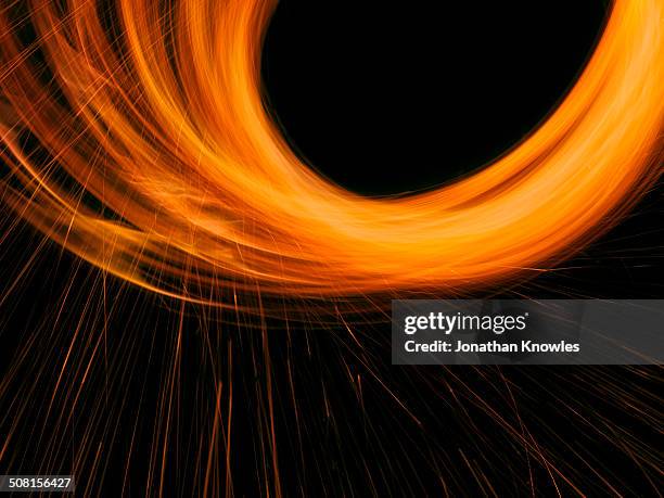 circle of light with sparks - spark imagination stock pictures, royalty-free photos & images