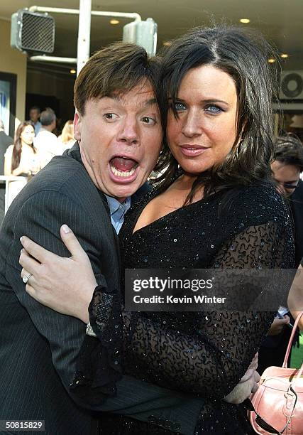 Actor Mike Myers and wife Robin attend the Los Angeles premiere of the Dreamworks Pictures' film "Shrek 2" at the Mann Village Theatre May 8, 2004 in...