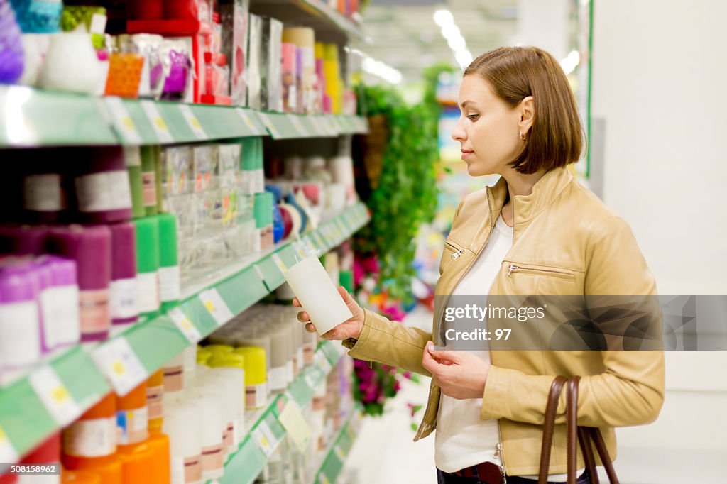 Woman buys candles