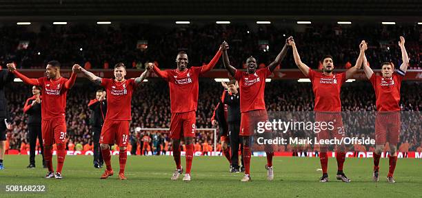 Liverpool players celebrate victory after the Capital One Cup Semi-Final Second Leg match between Liverpool and Stoke City at Anfield on January 26,...