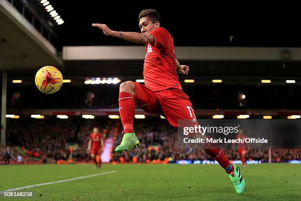 Roberto Firmino of Liverpool in action during the Capital One Cup Semi-Final Second Leg match between Liverpool and Stoke City at Anfield on January...