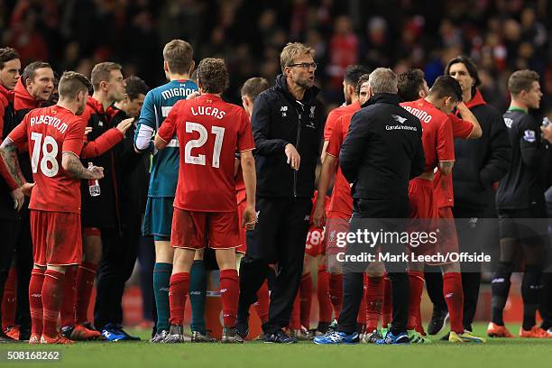 Liverpool manager Jurgen Klopp rallies his players during half-time in extra-time during the Capital One Cup Semi-Final Second Leg match between...