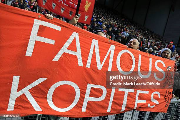 Liverpool fans display their 'Famous Kopites' banner during the Capital One Cup Semi-Final Second Leg match between Liverpool and Stoke City at...