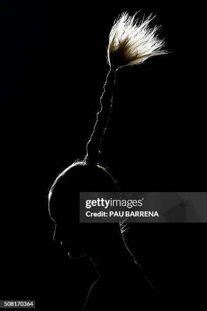 Model presents a creation by Oscarleon during the 080 Barcelona Autumn-Winter 2015-2016 fashion week in Barcelona on February 3, 2016. AFP PHOTO /...