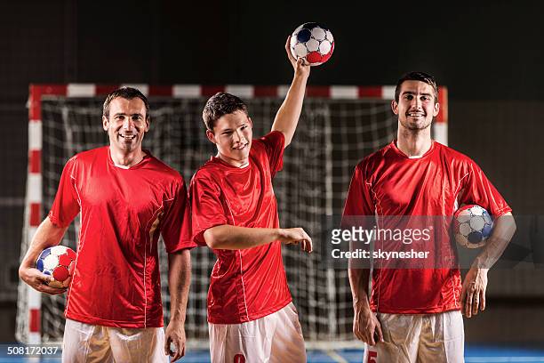 three handball players. - handball stock pictures, royalty-free photos & images