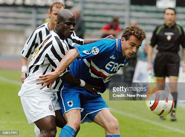 Stephan Appiah of Juventus clashes with Giacomo Cipriani of Sampdoria during the Serie A match between Juventus and Sampdoria played at the Delle...