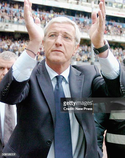 Juventus manager Marcello Lippi salutes the crowd after victory in his final match at Delle Alpi with Juventus following the Serie A match between...