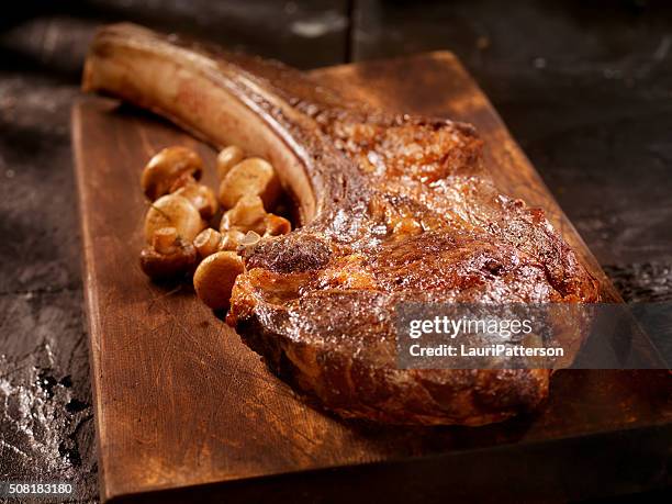 tomahawk, the ultimate steak - tomahawk stock pictures, royalty-free photos & images