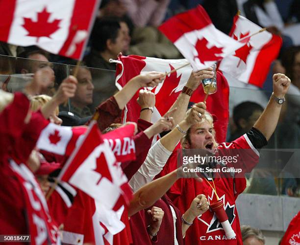 Fans of the Candian hockey team celebrate after Canada won the finals 5-3 against Sweden at the International Ice Hockey Federation World...